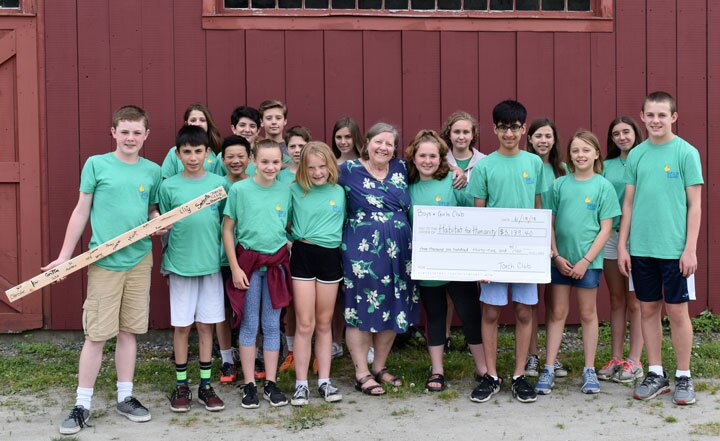 The Torch Club at the Boys & Girls Club of Redding-Easton present a check to Fran Normann of Housatonic Habitat for Humanity.