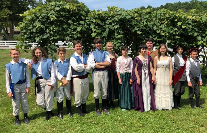 The cast of Much Ado About Nothing at New Pond Farm.